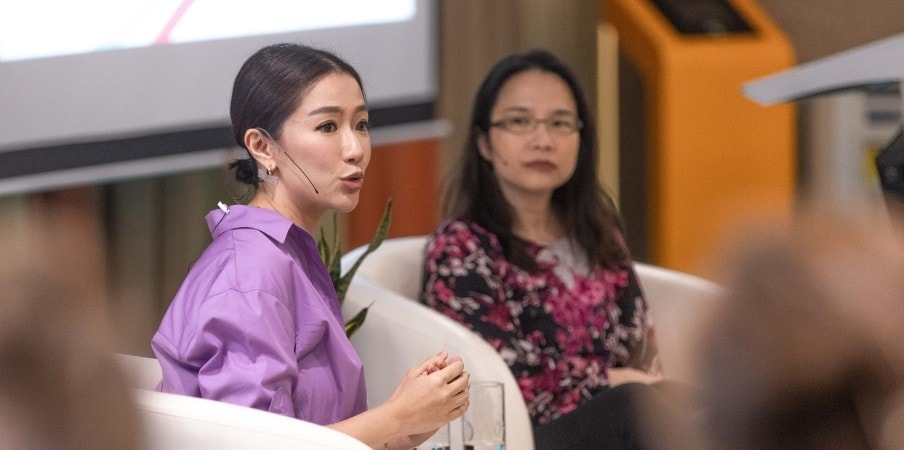 Connie Chan (right), Head of Financial Services, joins Rachel Lim, co-founder of Love, Bonito, on stage at a TWN event on International Women's Day 2023, where Rachel shared her journey as an entrepreneur